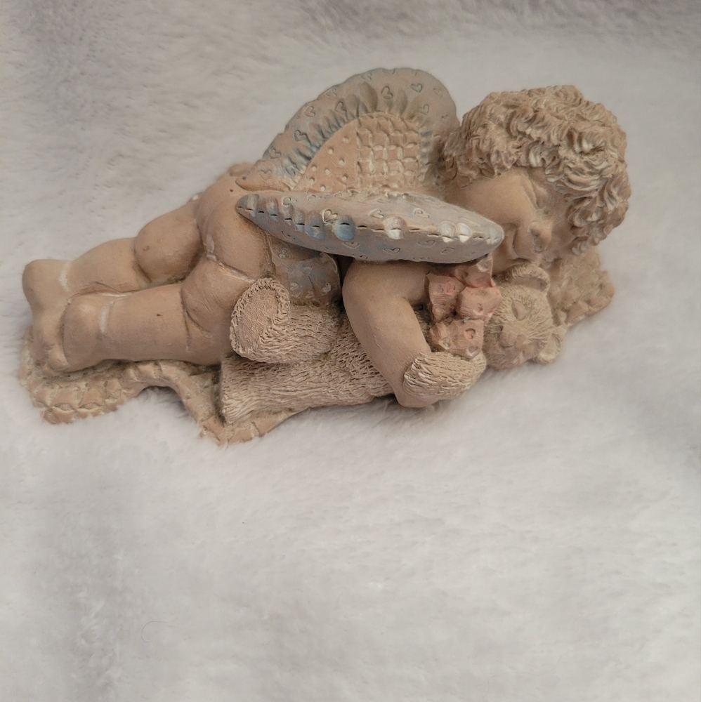 Carved baby angel